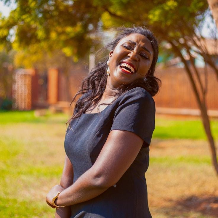 Alex Rivera, Lead Design Curator at Valley Prairie Grove, reviewing corporate floral arrangements